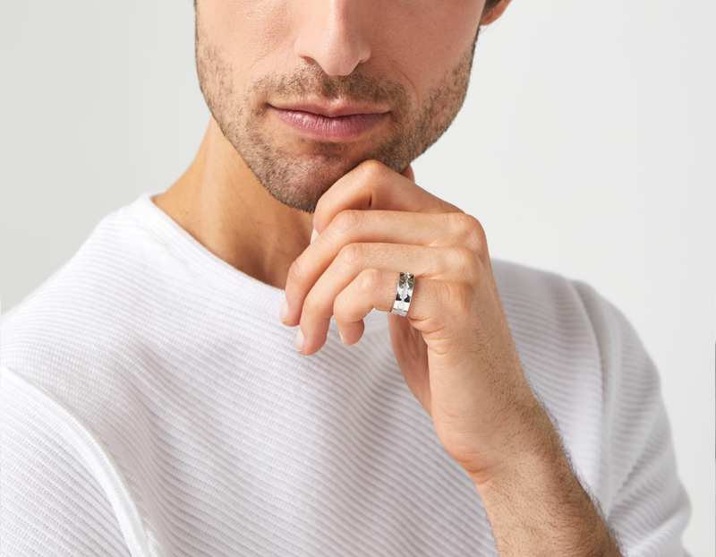 The Outer Wave Ring in Sterling Silver on a male