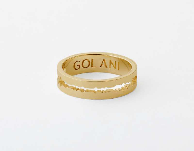 The Cut Wave Ring placed horizontal in 18-Karat Gold