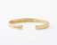 The Inner Wave Bracelet placed horizontal in 14-Karat Gold thumbnail