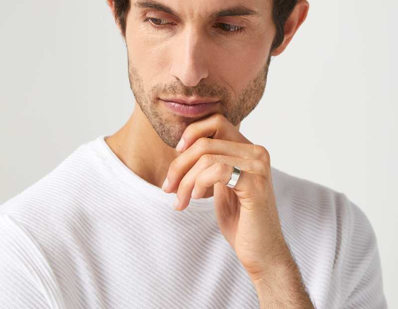 The Inner Wave Ring in Sterling Silver on a male
