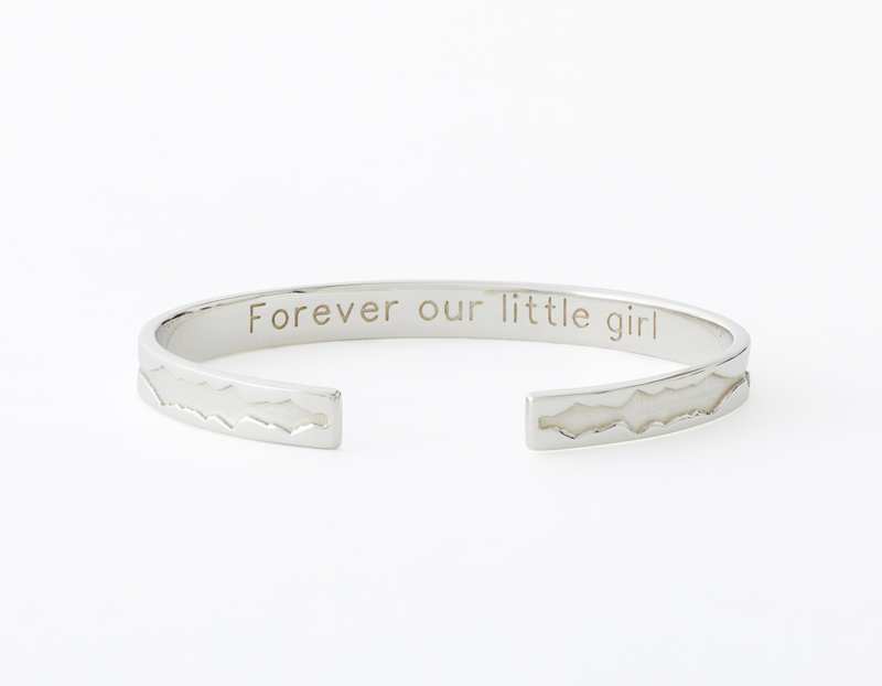 The Outer Wave Bracelet placed horizontal-inner in Sterling Silver
