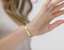 Video of The Inner Wave Bracelet in Rose Gold on a female thumbnail