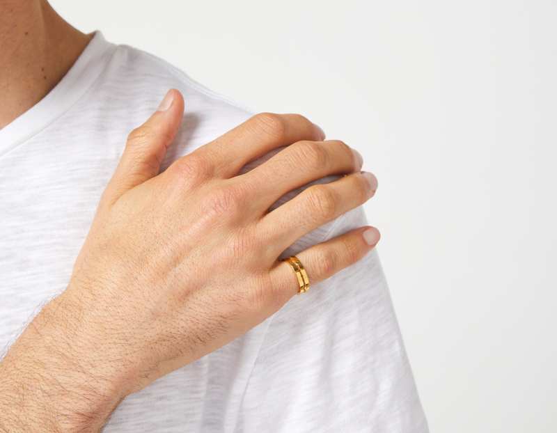The Cut Wave Ring in 18-Karat Gold on a male