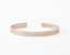 The Outer Wave Bracelet placed horizontal in Rose Gold thumbnail