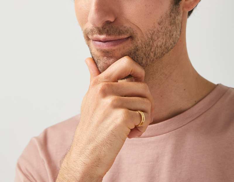 The Cut Wave Ring in 14-Karat Gold on a male
