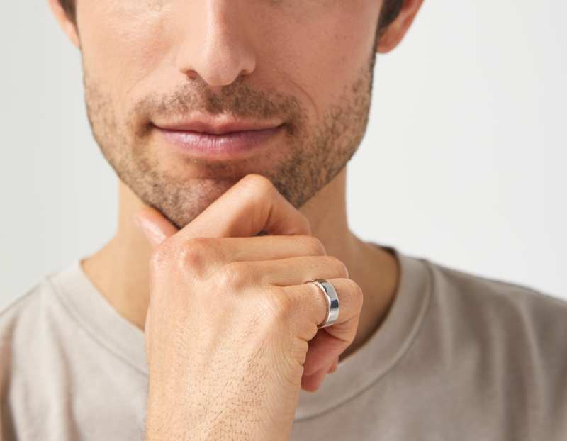 The Inner Wave Ring in Antiqued Sterling Silver on a male