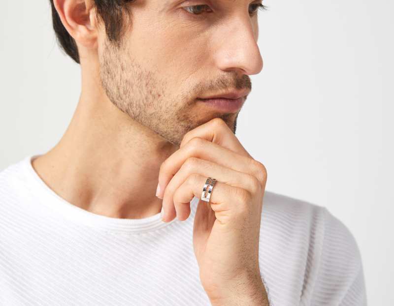 The Cut Wave Ring in Sterling Silver on a male