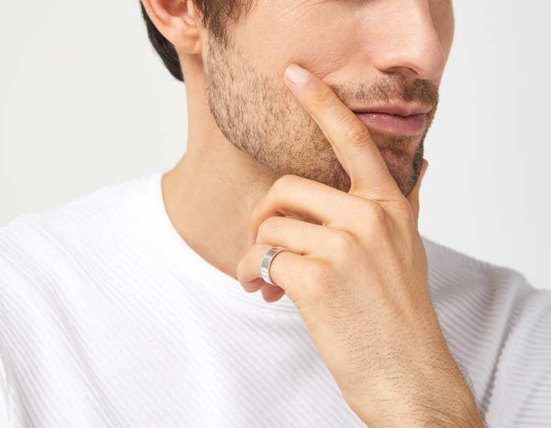 The Inner Wave Ring in Sterling Silver on a male