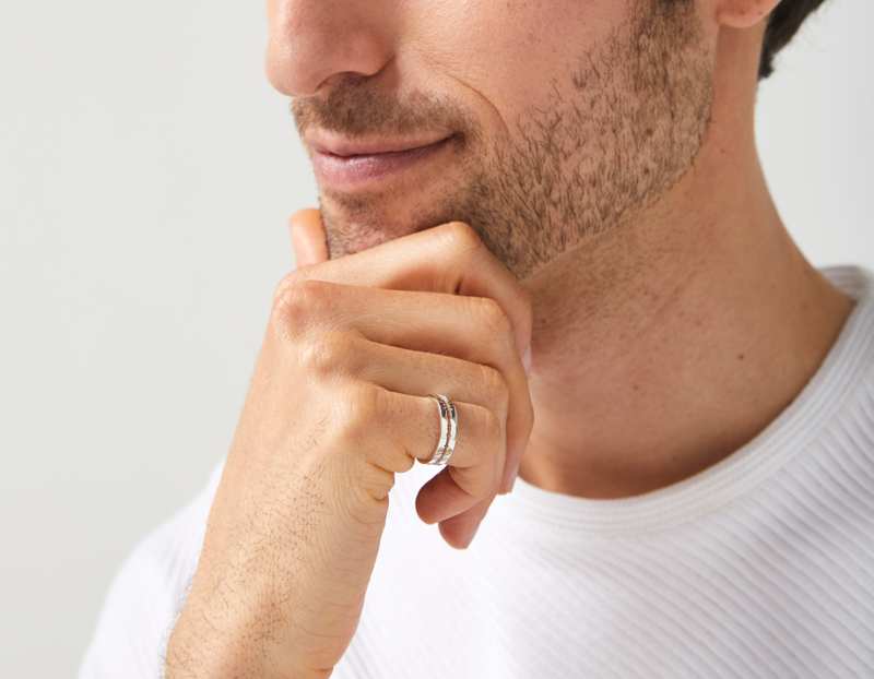 The Cut Wave Ring in Sterling Silver on a male