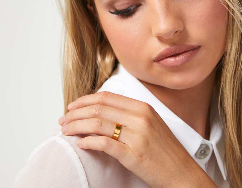 The Inner Wave Ring in 14-Karat Gold on a female