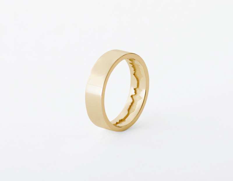 The Inner Wave Ring placed vertical in 14-Karat Gold